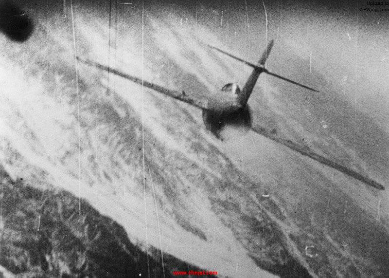 MiG-15_being_hit_over_Korea_c1953.jpg