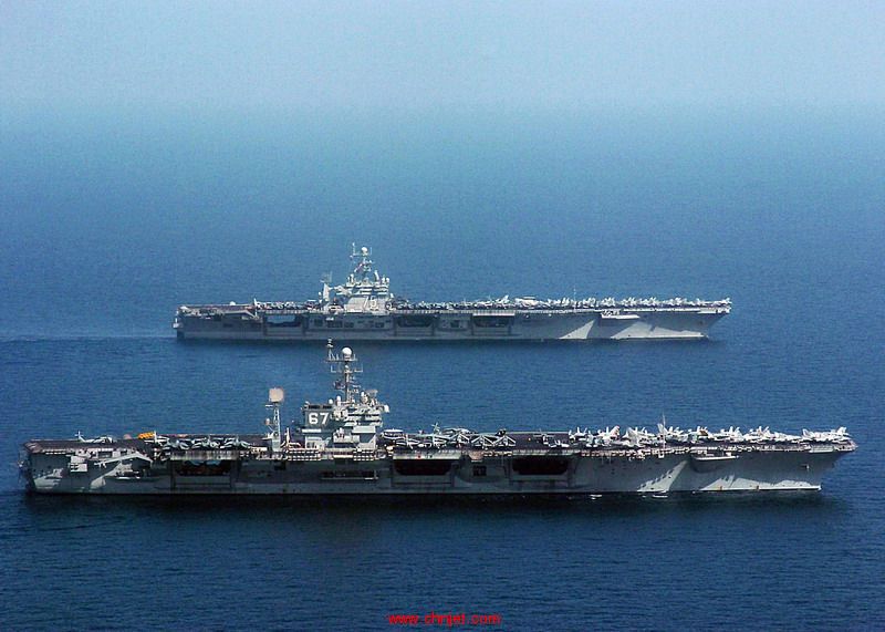 US_Navy_041120-N-4308O-141_The_conventional_aircraft_carrier_USS_John_F._Kennedy_(CV_67)_is_relieved_by_the_Nimitz-class_aircraft_carrier_USS_Harry_S._Truman_(CVN_75).jpg