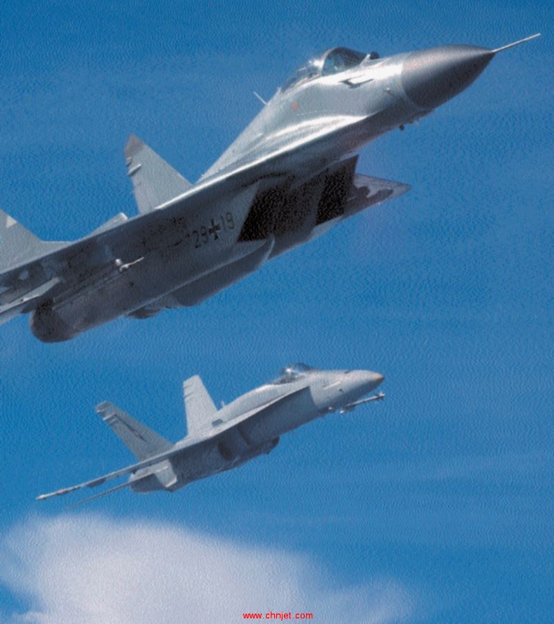 MiG-29G_JG_73_and_NSAWC_F-18C_in_flight_2002.jpg