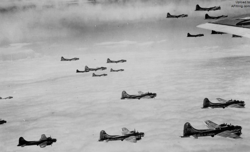 384th_Bomb_Group_8th_AF_B-17_Bombers_in_Formation_Over_Clouds.jpg