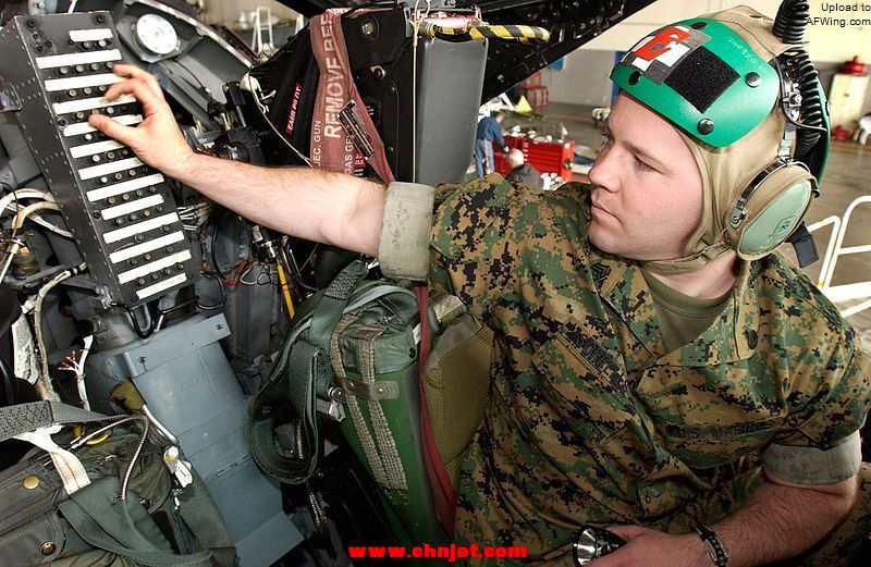 800px-US_Navy_040525-N-6436W-003_U.S._Marine_Corps_Staff_Sgt._Brandon_Sorellis,_of_Taylor,_S.C.,_inspects_circuit_breakers_in_the_cockpit_of_an_EA-6B_Prowler.jpg