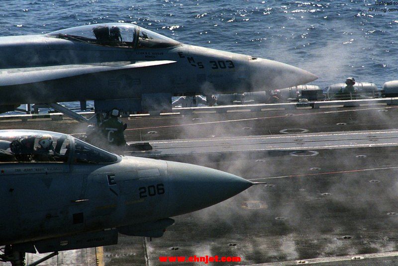 F-14_and_F-18_prepare_to_launch_from_USS_Nimitz.jpg