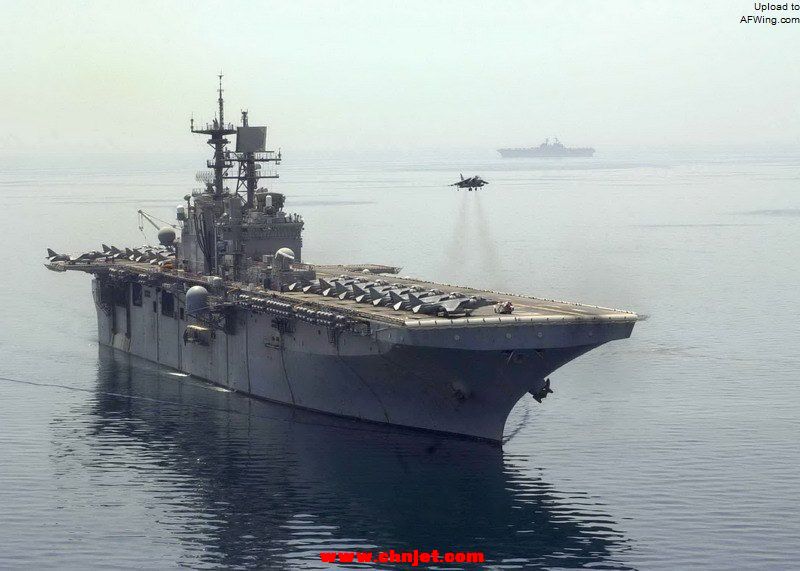 US_Navy_030425-N-4008C-508_An_AV-8B_Harrier_aircraft_hovers_above_the_flight_deck_of_the_amphibious_assault_ship_USS_Bataan_%28LHD_5%29.jpg