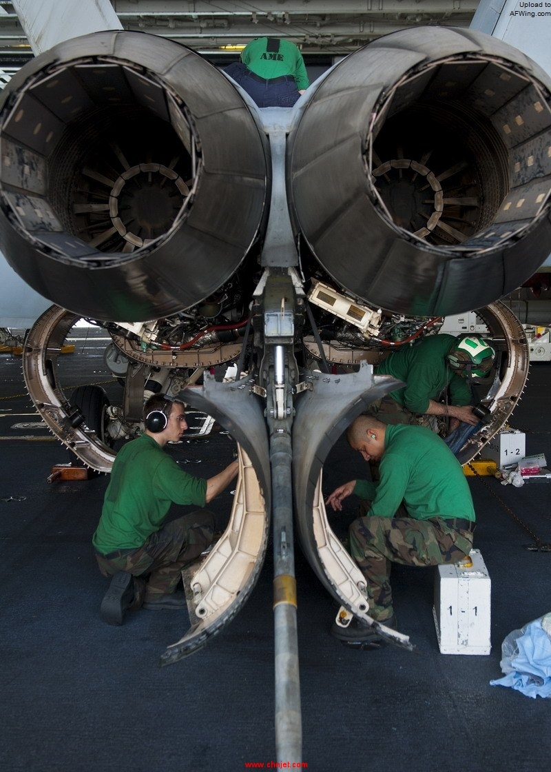 Defense.gov_News_Photo_120113-N-BT887-277_-_Sailors_perform_maintenance_on_an_F_A-18E_Super_Hornet_from_Strike_Fighter_Squadron_14_aboard_the_aircraft_carrier_USS_John_C._Stennis_CVN_74_in.jpg