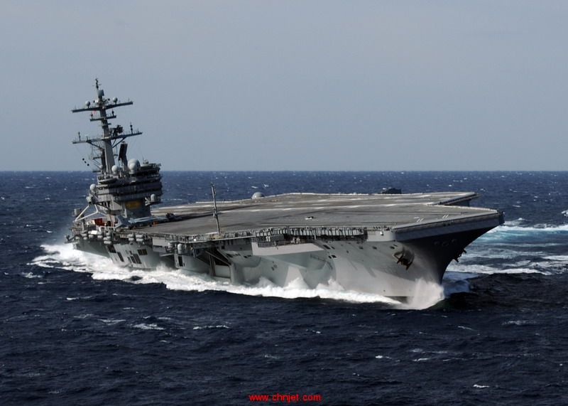 US_Navy_100227-N-4408B-613_USS_George_H.W._Bush_(CVN_77)_heels_hard_to_starboard_during_high-speed_drills.jpg